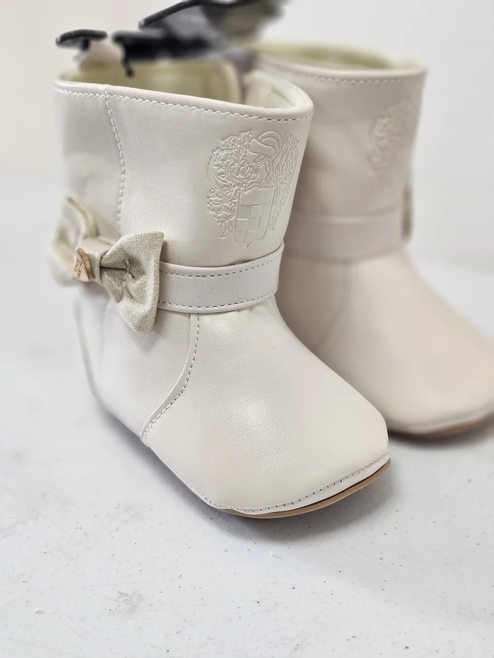 Vince Camuto Kids Cream Boots with Gold Bow Accent